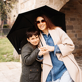 Mother and son on a Baku photo tour in Icherisheher Old Town